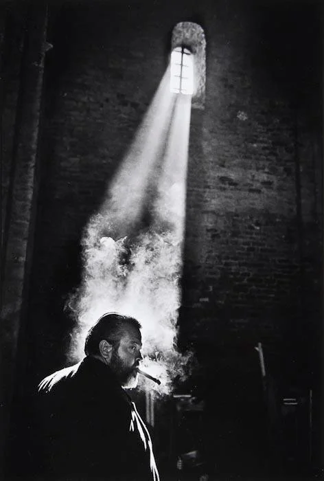 Orson Welles smoking